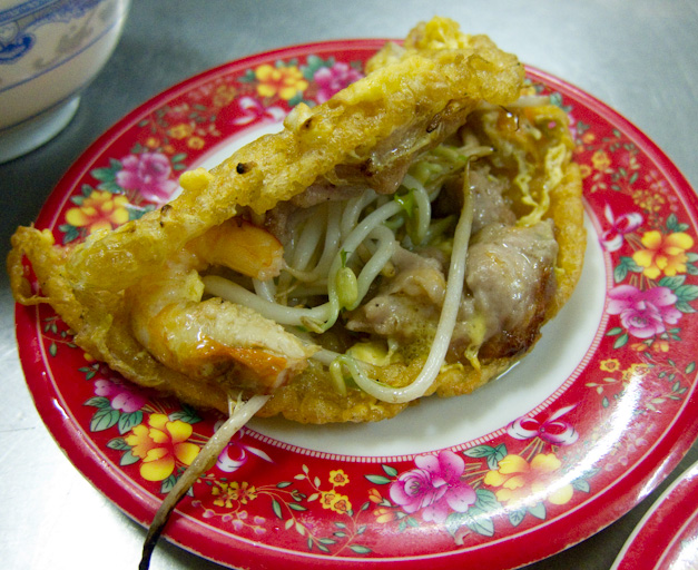 Vietnamese crispy fried pancake/crepe/omlette filled with shrimp, bean sprouts, and meat