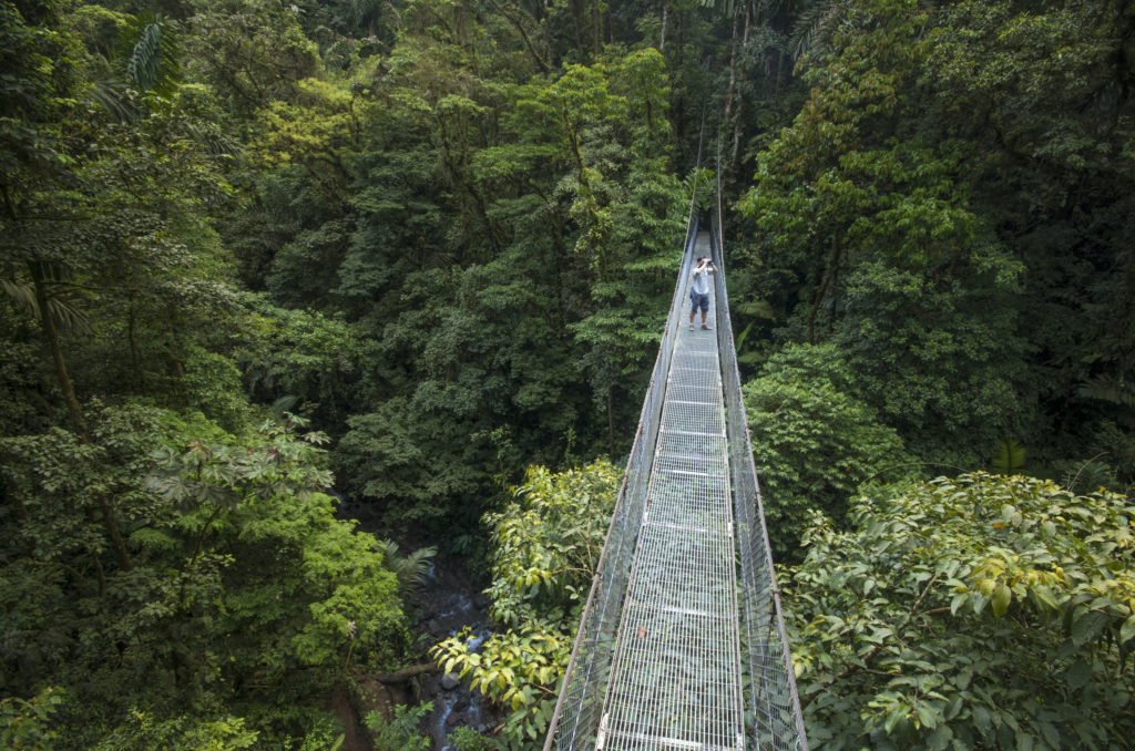 Cross the hanging bridges of Mistico Arenal