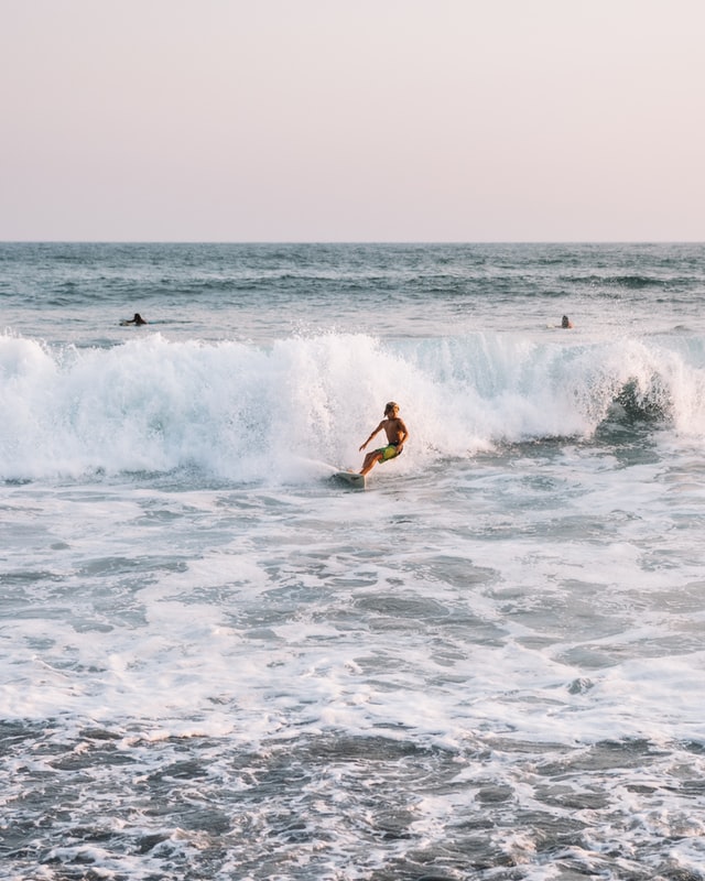Surf the coolest waves at Playa El Tunco