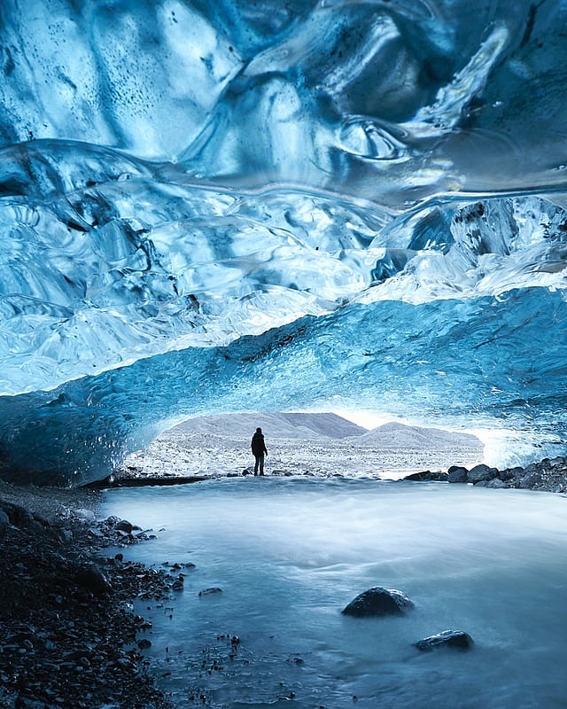 Explore the mysterious depths of a natural ice cave