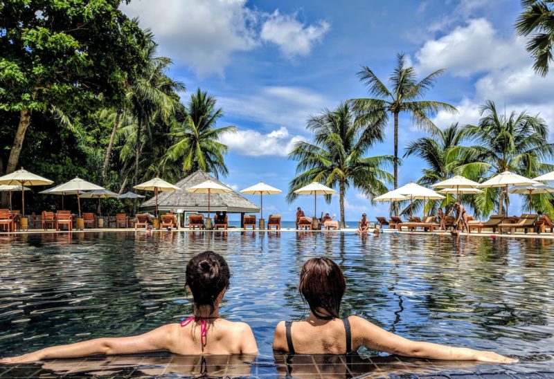 Two people swimming on their spring holidays