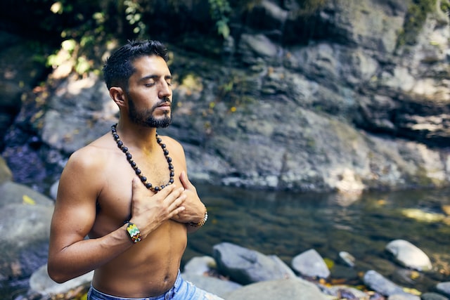 Man meditating in nature in Costa Rica