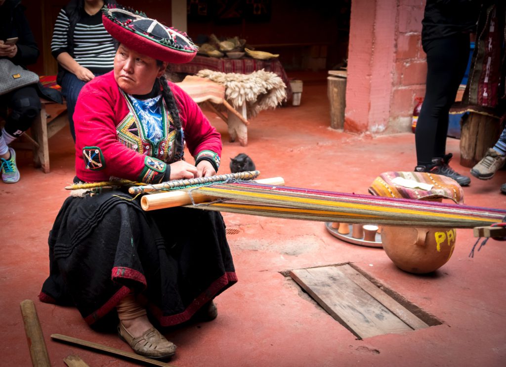 Woman weaving in Chinchero District, Peru