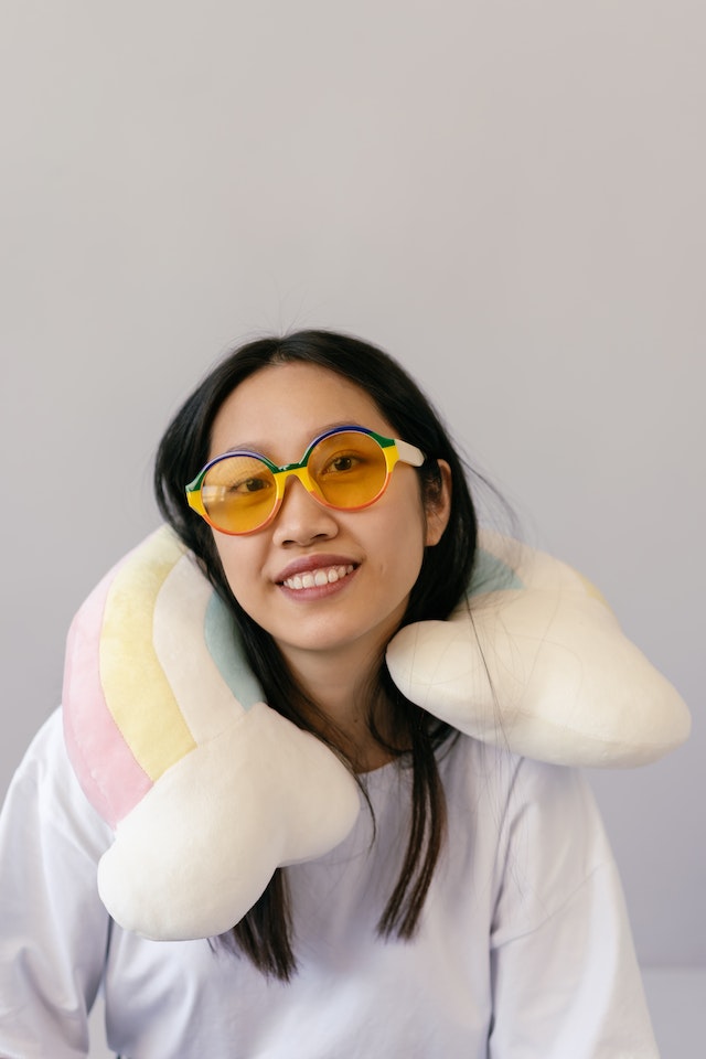 Woman with neck pillow