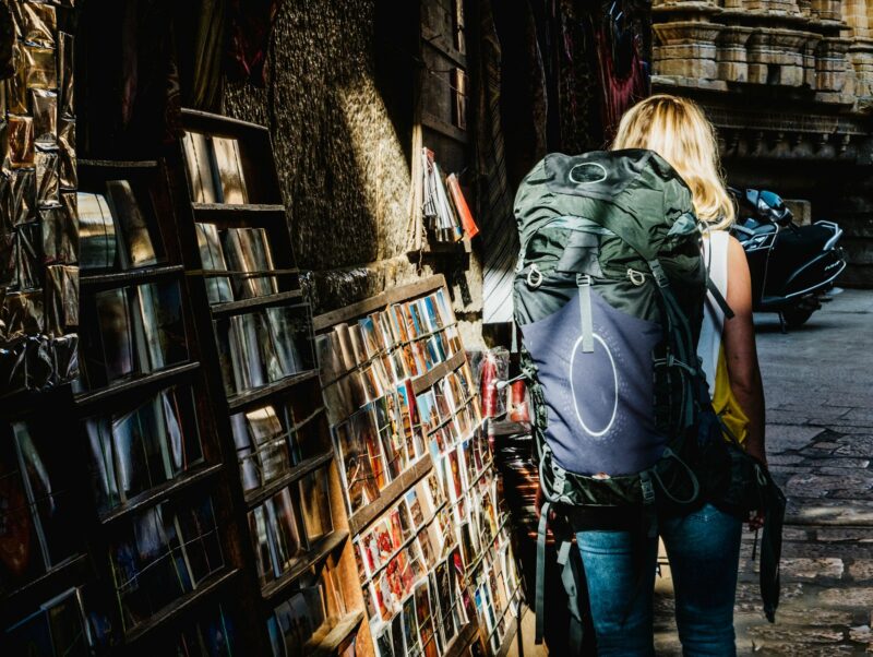Woman backpacking in city